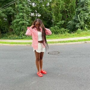 Red and White Striped Shirt with Orange Sandals